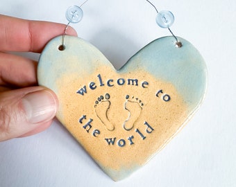 Welcome to the World Heart. New Baby arrival gift. Ceramic heart Blue /pink/grey. Made in Wales, UK. Free UK P&P