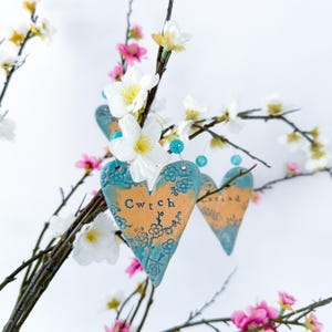 Welsh Ceramic Hanging Heart: Cwtch Calon Cariad - Handmade in Wales
