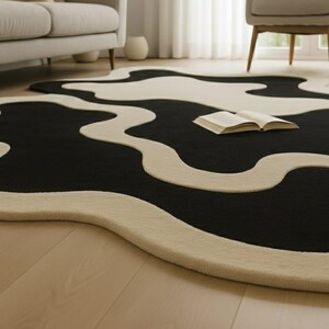 Modern neutral area rug
Contemporary organic rug
Interior design statement rug
Custom size abstract rug
Luxury hand tufted rug
Modern floor art rug
Organic abstract shape rug
Designer home interior rug
High quality wool rug
Modern aesthetic rug
Flowing pattern area rug
Premium handmade rug
Modern sculptural rug
Neutral decor statement rug
Art deco inspired rug