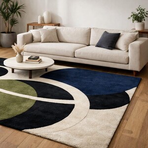 statement piece floor rug
high end wool rug
contemporary geometric carpet
modern style living room rug
abstract shape area rug
modern rug for apartments
handmade luxury carpet
designer abstract floor rug
modern decor centerpiece rug
stylish wool area rug
modern rug with cream tones
geometric modern home rug
art inspired living room rug