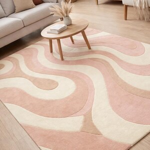 modern interior styling rug
pastel cream pink area rug
handcrafted rug for modern decor
statement carpet for living room
designer abstract wool rug
soft modern rug for comfort
art decor rug for home
minimal abstract area rug