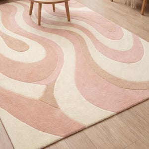 abstract rug
modern area rug
tufted wool rug
pink area rug
cream rug
pastel rug
wavy pattern rug
hand tufted rug
living room rug
bedroom rug
home decor rug
designer rug
soft wool rug
boho modern rug
minimal rug
contemporary rug
custom size rug
5x7 rug
6x9 rug
8x10 rug
floor decor
luxury rug
indoor rug
statement rug
neutral rug
art rug
trendy rug
handmade rug
modern carpet
area carpet