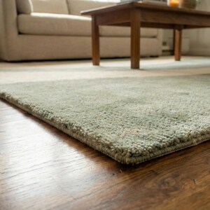 sage green wave rug living room modern abstract area rug neutral carpet home decor
soft sage green abstract rug wavy pattern large area rug contemporary living room
modern sage green beige rug minimalist abstract carpet stylish home decor
large sage green wave rug cozy living room neutral aesthetic floor carpet
abstract sage green rug soft textured modern home interior decor carpet
minimalist wave rug sage green contemporary living room soft area rug
modern abstract sage rug large neutral