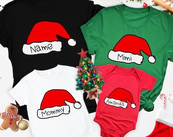 クリスマスファミリーお揃いシャツ、ファミリークリスマスシャツ、お揃いクリスマスTシャツ、カスタムネームクリスマスTシャツ、お揃いノエルファミリーギフト、クリスマスTシャツ