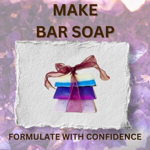 May include: Four colourful bar soaps stacked and tied with a maroon ribbon. The soaps are white, blue, purple, and pink. The image includes the text "MAKE BAR SOAP" and "FORMULATE WITH CONFIDENCE".