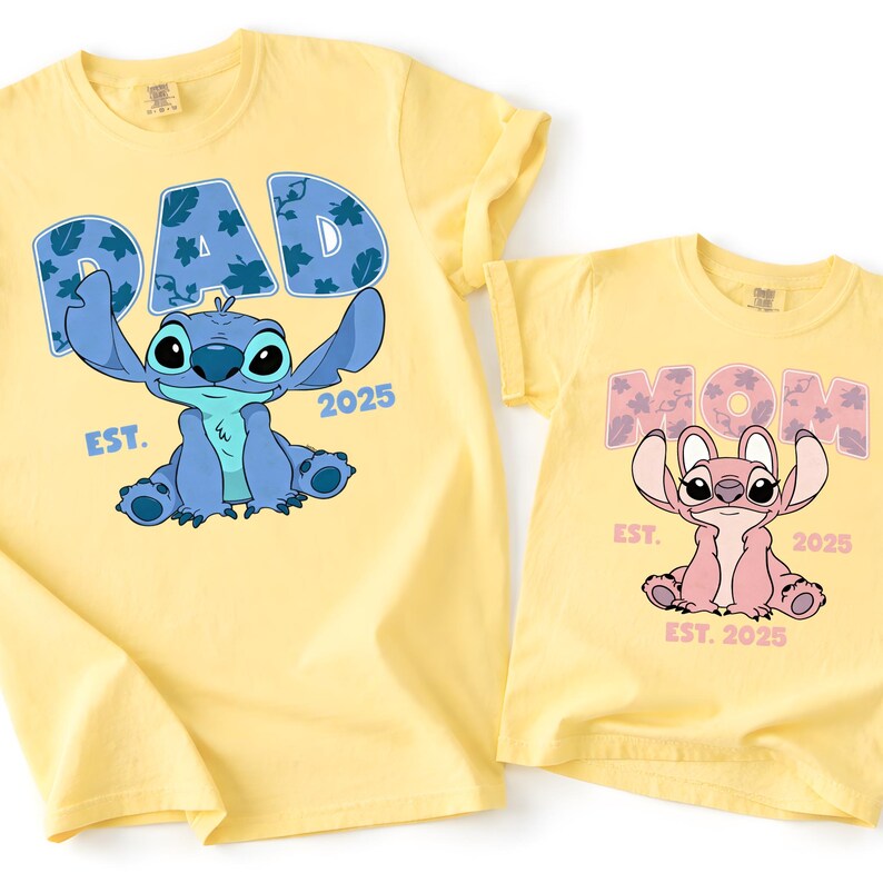 Two yellow t-shirts with the same design featuring the characters Stitch and her offspring, Mom.