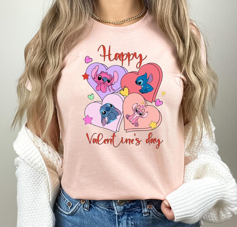 A woman wearing a pink t-shirt with a graphic design featuring characters from the Disney animated film "Stitch" and the text "Happy Valentine's day".