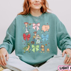 a woman sitting on the floor with her legs crossed