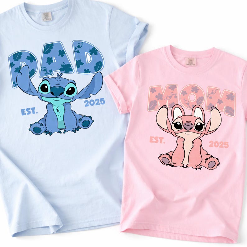 two t-shirts with cartoon characters on them, one in blue and one in pink.