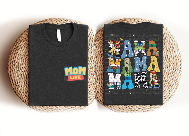 a couple of black shirts sitting on top of a table