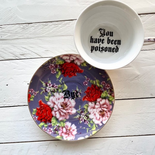 You've been Poisoned, Purple Floral Tea Cup & Bye Saucer