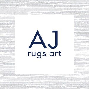 May include: White square logo with the navy blue letters "AJ" above the words "rugs art" in navy blue. The background is a textured, light gray pattern.