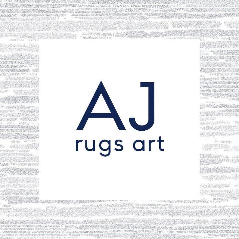 May include: White square logo with the navy blue letters "AJ" above the words "rugs art" in navy blue. The background is a textured, light gray pattern.