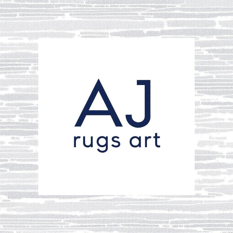 May include: A square logo featuring the dark blue text AJ rugs art centered on a white background. The logo is framed by a light gray border with a horizontal, textured, dashed line pattern that creates a subtle visual contrast around the center.