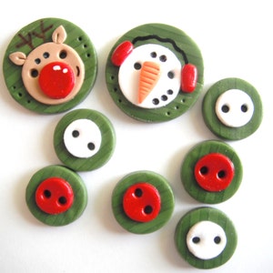 May include: Set of eight green and white Christmas buttons with various holiday designs, including a snowman, reindeer, and simple red and white buttons.