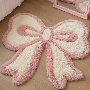 Tappeto rosa a pelo lungo con fiocco, trapuntato a mano, grazioso complemento d'arredo per la camera da letto, tappeto kawaii carino, tappeto morbido con fiocco, tappeto per camera da ragazza, tappeto morbido e lussuoso per la cameretta dei bambini.