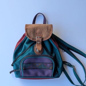 Vintage 1990s Mini Backpack | Teal & Maroon Canvas With Southwestern Geometric Trim | Suede Flap Small Daypack Festival Bag - Etsy Vintage 1990s Mini Backpack | Teal & Maroon Canvas With Southwestern Geometric Trim | Suede Flap Small Daypack Festival Bag - Etsy