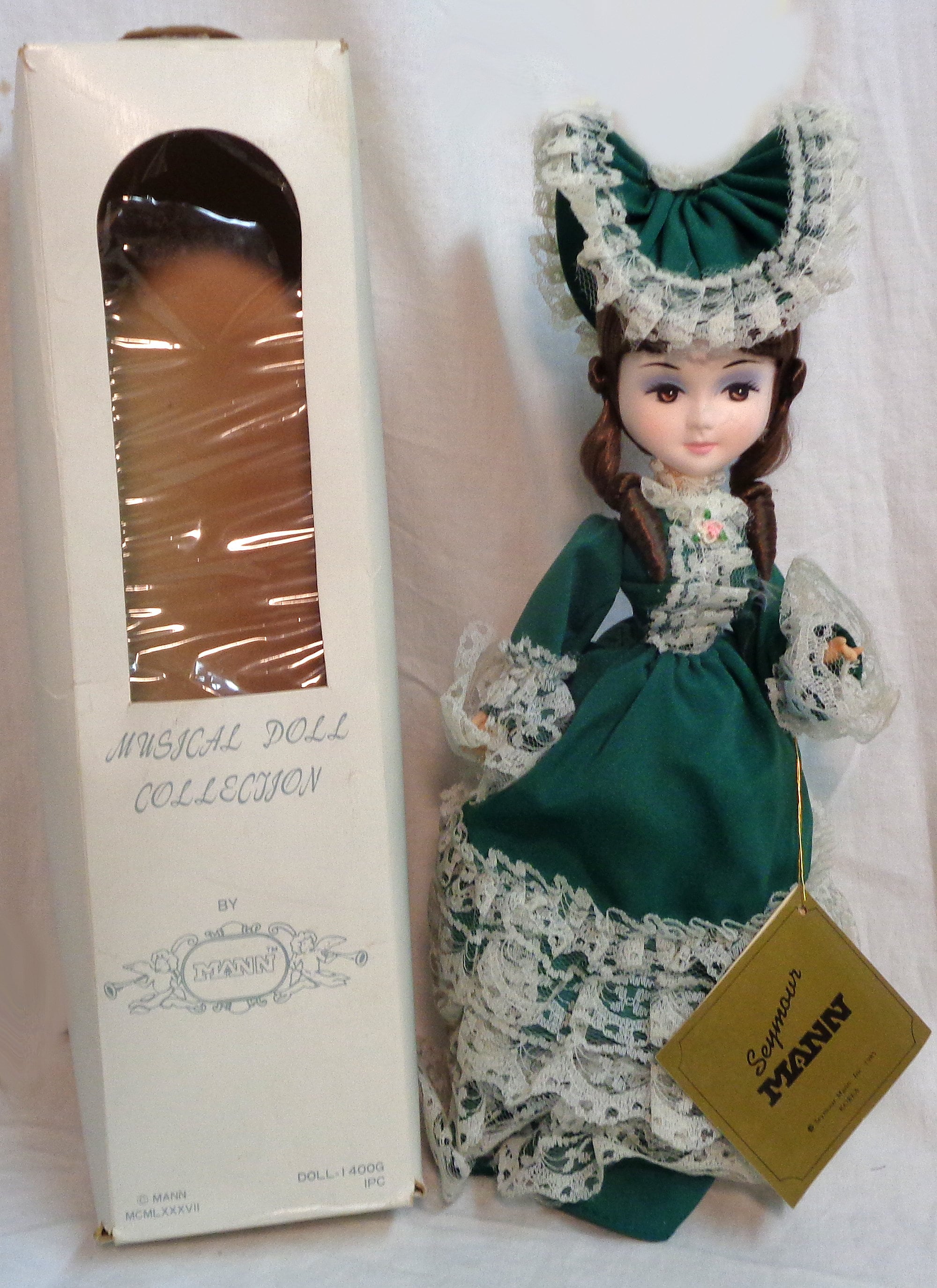 Vintage Seymour Mann Porcelain Musical Doll - Wearing a Green