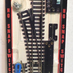 HO Scale ATLAS Left Remote Switch Track - Mint op kaart!