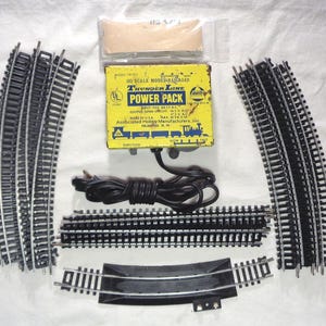 HO Scale Complete train track oval with Nickel-Silver Track and AHM power transformer - All you need are the trains! This is pre-owned.