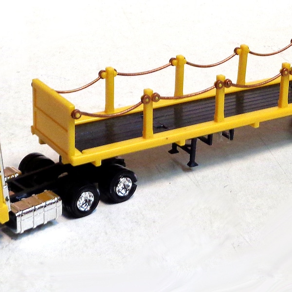Very rare HO Scale GMC Semi Tractor Trailer Stake Truck - Great trackside vehicle on your HO Scale Train layout or diorama. Includes Driver!