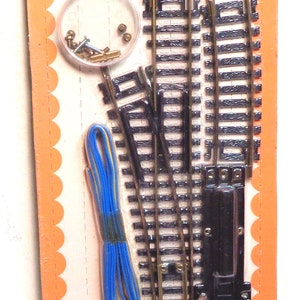 Schaal HO LIFELIKE Left Remote Switch Track - Nieuw op kaart met alle accessoires!