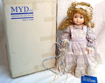 Vintage Marian Yu Designs Porcelain Doll - "Maria" Blonde Hair w/Floral pattern dress-Pre-owned(Please see description details on condition)