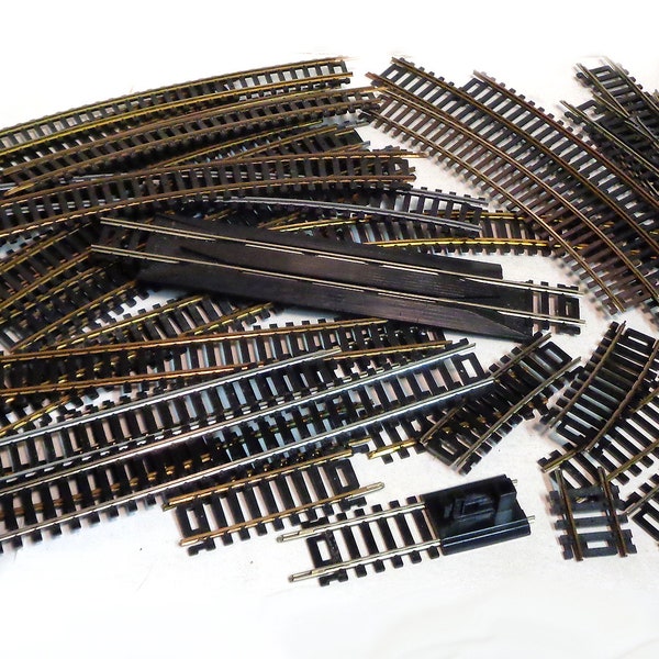 HO Scale Mostly ATLAS used Track in assorted sizes(35 pieces in all)  - All in very good reusable condition!