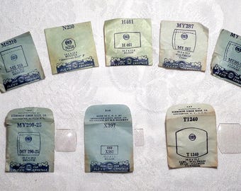 Lot of 10 Watch Face Crystals - old stock all different in orig. packages-Replace an old broken/worn watch crystal OR for crafting projects!