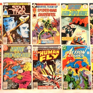 May include: A collection of 10 vintage comic books featuring characters like Star Trek, Spider-Man, Daredevil, Superman, and Red Sonja. The covers are colorful and feature action-packed scenes.