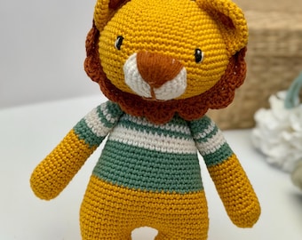Leone di peluche all'uncinetto: giocattolo amigurumi in cotone fatto a mano, decorazione per la cameretta.