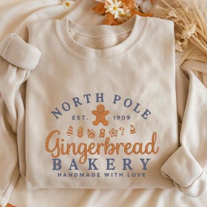 Gewaschene Farbe bestickte Lebkuchen-Bäckerei-Sweatshirt: Gemütlicher Weihnachts-Crewneck