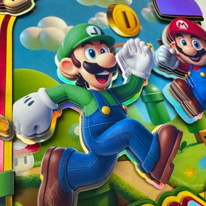 May include: A colorful, layered image featuring the characters Luigi and Mario from the Super Mario Bros. franchise. Luigi is in mid-jump, with a green hat and overalls. Mario is also present. The background includes a blue sky, clouds, and a gold coin.