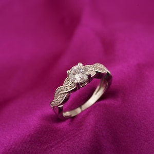 Solitaire Moissanite Ring: 14K White Gold Plated Sterling Silver