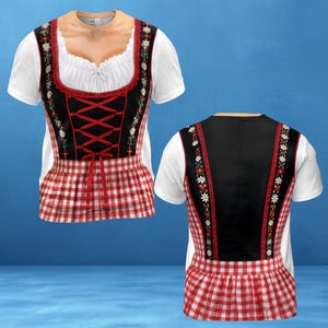 May include: A short-sleeved t-shirt featuring a printed design of a dirndl with a white blouse, a black bodice with red lace-up detailing, and a red and white checkered skirt pattern. The design includes floral accents and red lace trim.
