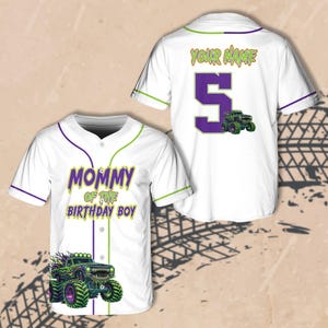 May include: White baseball jersey with green and purple accents. The front features the text "MOMMY OF THE BIRTHDAY BOY" and a monster truck graphic. The back has the text "YOUR NAME" above a large purple number 5 and a monster truck graphic.