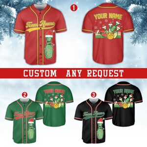 May include: Baseball jerseys in red, green, and black, each with a unique design. The jerseys feature bowling pin graphics with Santa hats and Christmas lights. The text "Team Name" and "Your Name" are displayed on the jerseys. The phrase "CUSTOM ANY REQUEST" is also visible.