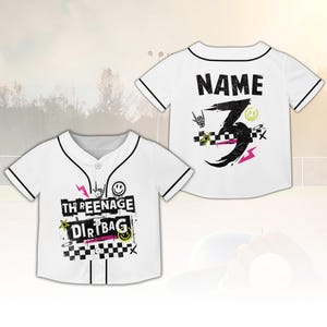 May include: White baseball jersey with black trim and buttons. The front features the text "THREENAGE DIRT BAG" with graphic elements. The back displays "NAME" above a large number 3 with additional graphics. A fun, youthful design.