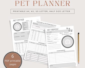 May include: A pet planner with printable pages, featuring sections for pet sitters, feeding, responsibility, and pet profiles. Includes spaces for pet details, vaccination records, and daily tasks. A pencil rests on the side.