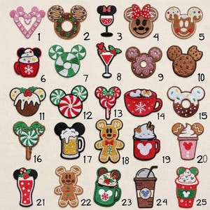 May include: A collection of 25 embroidered patches in various shapes and designs. The patches feature holiday and food themes, including gingerbread men, donuts, and drinks, with Mickey Mouse ears.