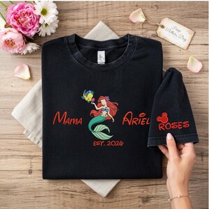 May include: A set of three ceramic mugs with a speckled, matte finish. The mugs are in shades of cream, light gray, and dark gray. Each mug has a simple, minimalist design and a rounded handle.