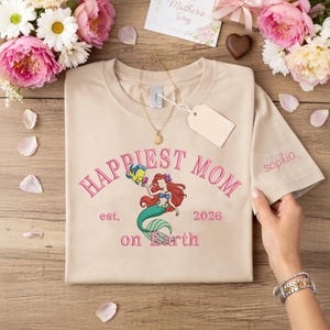 May include: A rustic wooden sign with the text "Welcome to our home" in white lettering. The sign features a distressed finish and a simple, inviting design, perfect for a front porch or entryway.