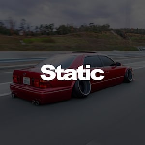 May include: A maroon sedan with lowered suspension is shown in motion on a highway. The word "Static" is overlaid in large white letters across the car's body. The car has dark tinted windows and a sunroof.