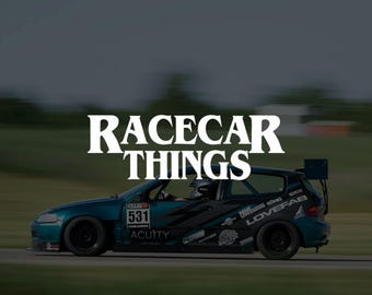 May include: A teal race car with black wheels and a rear spoiler is shown in motion on a track. The car has the number 531 on the side and the text "RACECAR THINGS" is overlaid on the image.