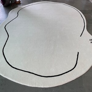 Abstract White Rug – Modern Irregular Shape Hand-Tufted Wool Carpet with Black Line Art for Living Room, Bedroom, and Decor Spaces