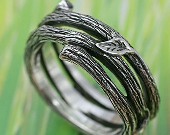 TWIG AND LEAF Band - Delicate Little Leaves On a Spiralling Twig. This ring hand made in sterling silver