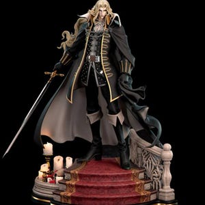 May include: A detailed figurine of a character with long blonde hair, wearing a black coat with gold trim, and holding a sword. The figure stands on a red carpeted platform with candles and decorative elements, set against a black background.
