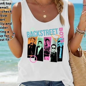 May include: White tank top featuring a graphic of the Backstreet Boys with the band's name in teal and pink. The image includes text that says "Important: This tank top runs small. Please check the size chart carefully and consider ordering a size up for the best fit."