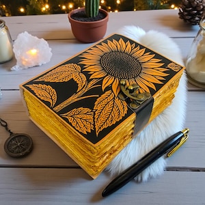Lederbuch mit Sonnenblumen – Handgemachtes Notizbuch mit Schloss