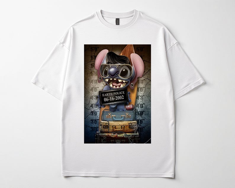 May include: White t-shirt with a cartoon character wearing sunglasses and holding a sign that reads "EARTH POLICE 06-16-2002." The character is standing on a stack of suitcases. The design is centered on the shirt.